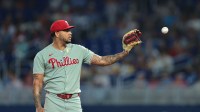 Philadelphia Phillies starting pitcher Taijuan Walker (99) catches a baseball against the Miami Marlins during the first inning at loanDepot Park.