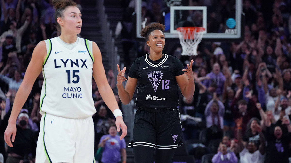 Golden State Valkyries center Iliana Rupert (12) celebrates after scoring a basket as Minnesota Lynx forward Jessica Shepard (15) looks on in the fourth quarter at Chase Center.