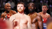 Terence Crawford and Canelo Alvarez front and center. Behind them is Floyd Mayweather and Manny Pacquiao. All in boxing gear.