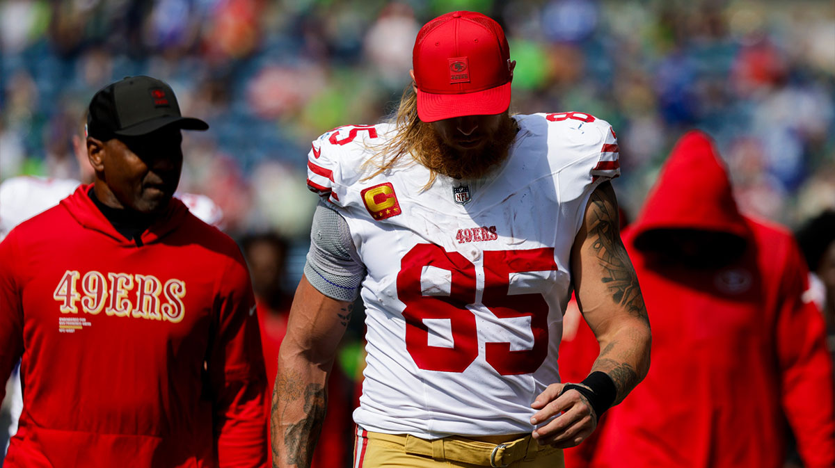 San Francisco 49ers tight end George Kittle (85) returns to the locker room for halftime against the Seattle Seahawks at Lumen Field.