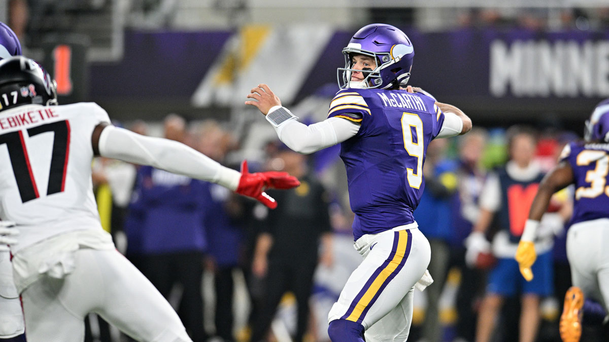 Minnesota Vikings quarterback J.J. McCarthy (9) throws a pass during the first half against the Atlanta Falcons at U.S. Bank Stadium.
