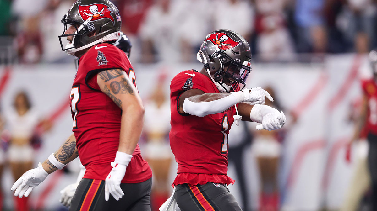 Tampa Bay Buccaneers running back Rachaad White (1) celebrates after scoring a touchdown during the fourth quarter against the Houston Texans at NRG Stadium.