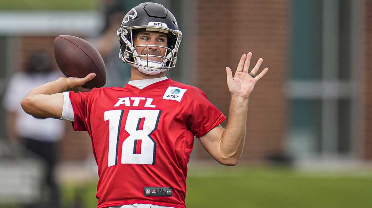 Atlanta Falcons quarterback Kirk Cousins (18) passes during training camp at IBM Performance Field.