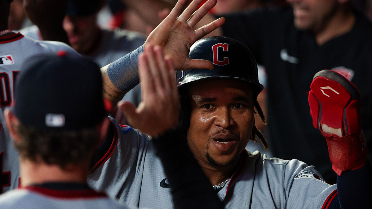 Cleveland Guardians third baseman Jose Ramirez (11) celebrates after scoring against the Minnesota Twins during the fifth inning of game two of a double header at Target Field. 