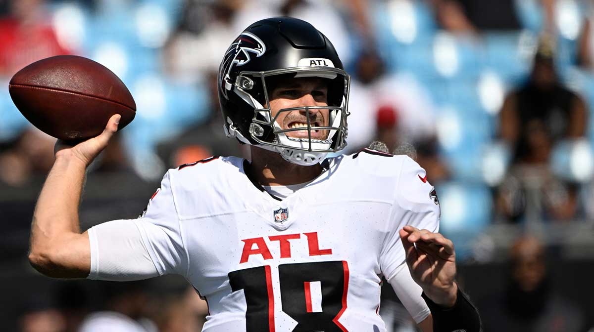Atlanta Falcons quarterback Kirk Cousins (18) looks to pass in the fourth quarter at Bank of America Stadium. 