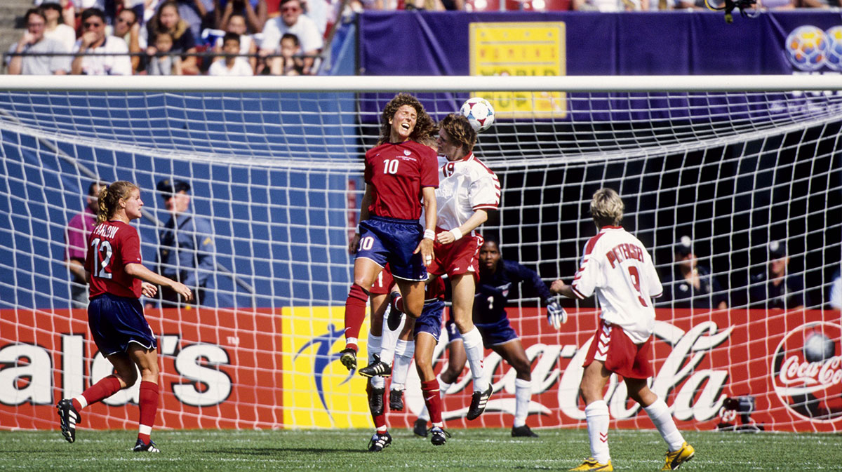 FILE PHOTO; USA midfielder Michelle Akers (10) and goal keeper Briana Scurry (1) in action against Denmark forward Janni Johansen (19) and forward Christina Petersen (9) during the 1999 women's World Cup at Giants Stadium. 
