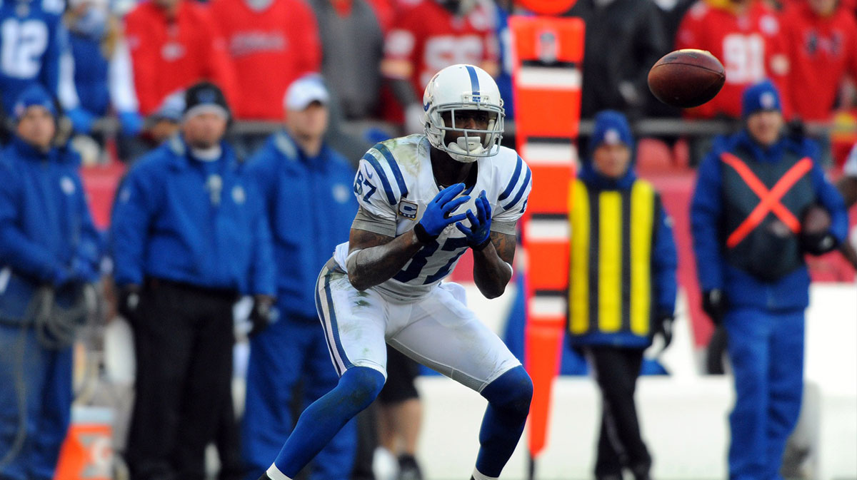 Indianapolis Colts wide receiver Reggie Wayne (87) catches a pass in the second half of the game against the Kansas City Chiefs at Arrowhead Stadium. The Colts won 20-13. 