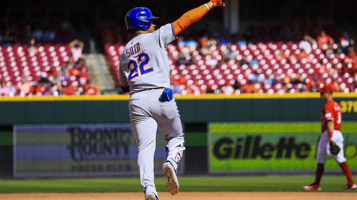 New York Mets designated hitter Juan Soto (22) reacts after hitting a solo home run in the ninth inning against the Cincinnati Reds at Great American Ball Park. 