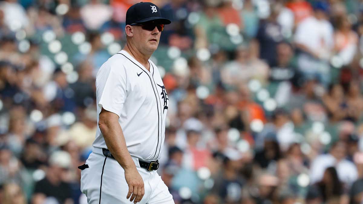 Detroit Tigers manager A.J. Hinch (14) walks to the pitchers mound in the eighth inning against the Cleveland Guardians at Comerica Park.