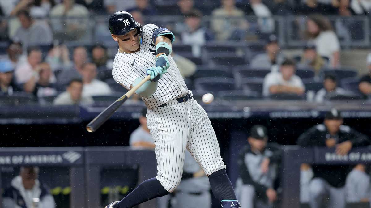 New York Yankees right fielder Aaron Judge (99) hits a solo home run against the Chicago White Sox during the eighth inning at Yankee Stadium. The home run was his second of the game.
