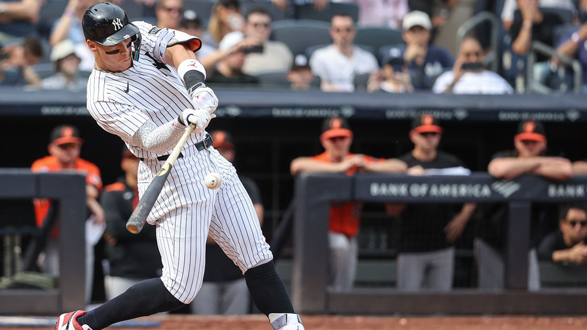 New York Yankees right fielder Aaron Judge (99) hits a two run single in the fifth inning against the Baltimore Orioles at Yankee Stadium. 