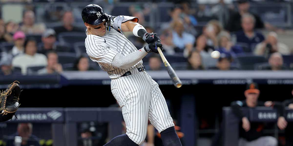 New York Yankees right fielder Aaron Judge (99) hits a two run home run against the Baltimore Orioles during the third inning at Yankee Stadium.