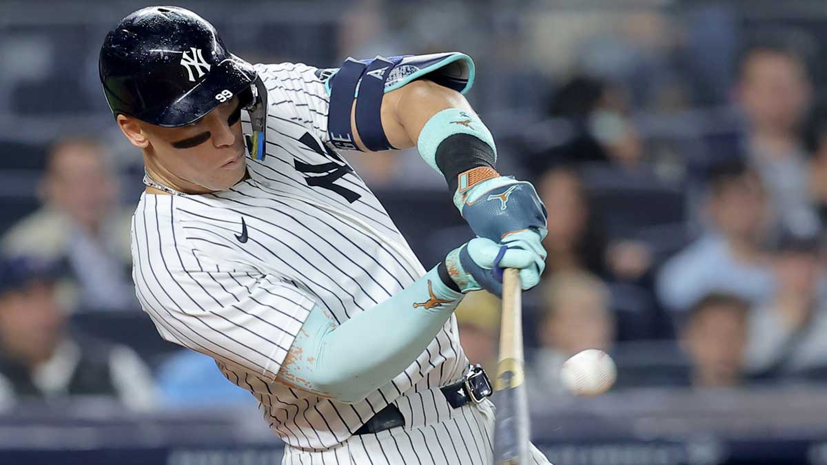 New York Yankees right fielder Aaron Judge (99) hits a three run home run against the Chicago White Sox during the second inning at Yankee Stadium.