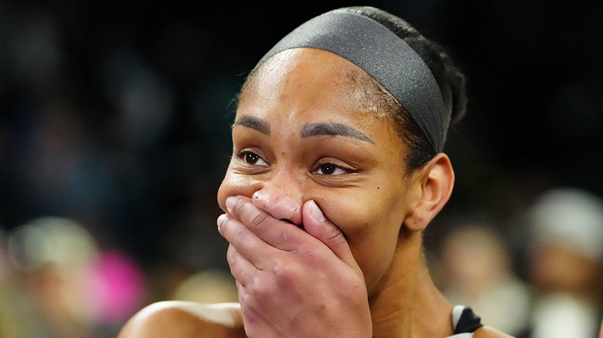 Las Vegas Aces center A'ja Wilson (22) reacts during an interview after the Aces defeated the Indiana Fever 107-98 in overtime of game five of the second round for the 2025 WNBA Playoffs at Michelob Ultra Arena.