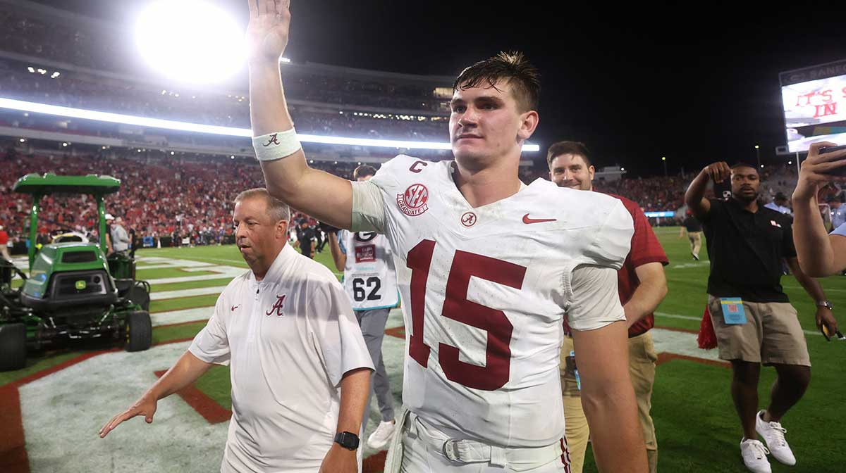 Alabama Crimson Tide quarterback Ty Simpson (15) celebrates after defeating the Georgia Bulldogs at Sanford Stadium.