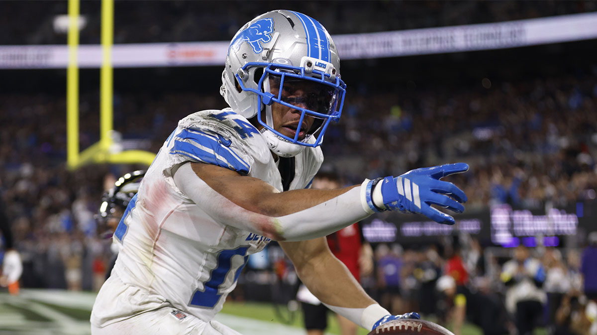 Detroit Lions wide receiver Amon-Ra St. Brown (14) reacts after a touchdown against the Baltimore Ravens during the second half at M&T Bank Stadium.