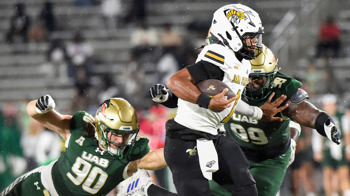 Alabama State quarterback Andrew Body (1) rolls out against UAB during their game at Protective Stadium in Birmingham Ala., on Thursday evening August 27, 2025.