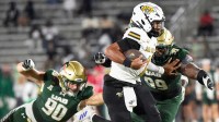 Alabama State quarterback Andrew Body (1) rolls out against UAB during their game at Protective Stadium in Birmingham Ala., on Thursday evening August 27, 2025.