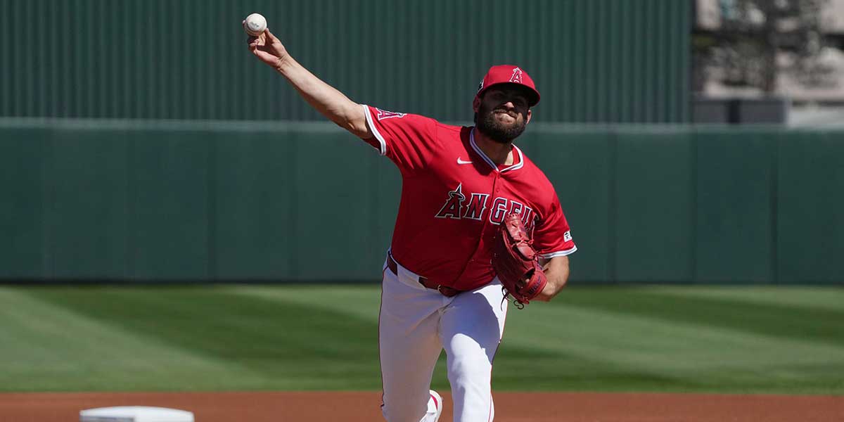 Los Angeles Angels pitcher Chase Silseth (63) throws against the Colorado Rockies in the first inning at Tempe Diablo Stadium.