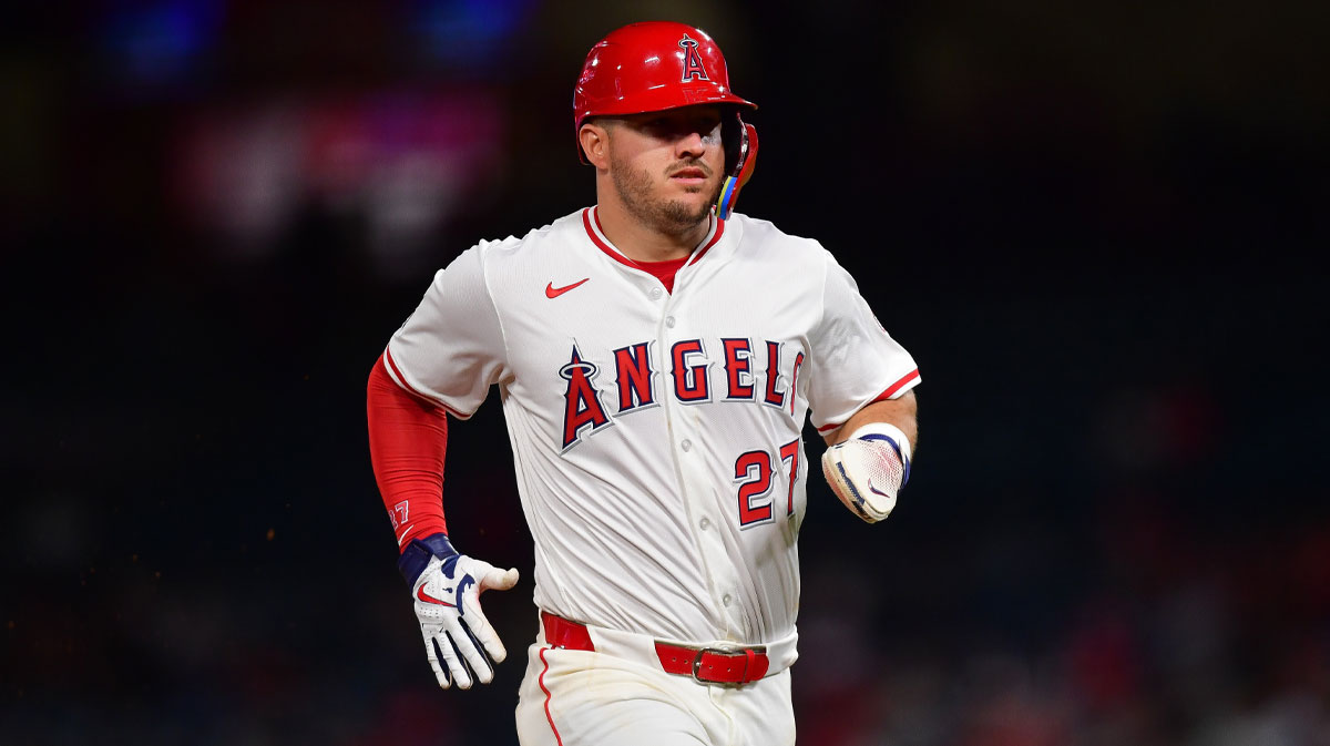 Los Angeles Angels designated hitter Mike Trout (27) reaches third against the Minnesota Twins during the fifth inning at Angel Stadium.