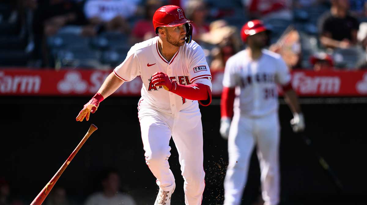 Los Angeles Angels first baseman Carter Kieboom (17) hits a single during the ninth inning against the Houston Astros at Angel Stadium.