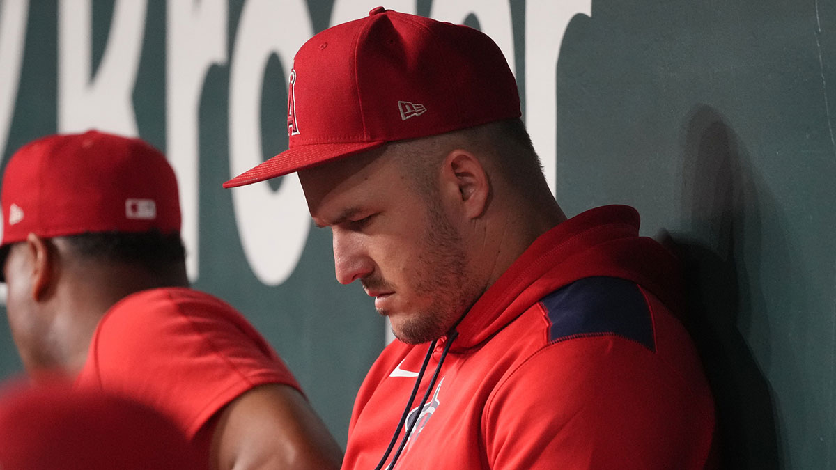 Los Angeles Angels right fielder Mike Trout (27) sits in the dugout during the fifth inning against the Texas Rangers at Globe Life Field.
