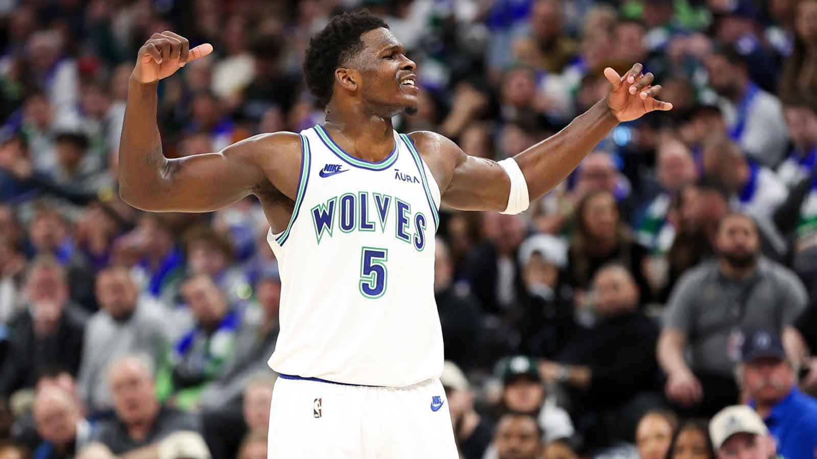 Minnesota Timberwolves guard Anthony Edwards (5) reacts after a foul was called against him against the Brooklyn Nets during the second half at Target Center. 