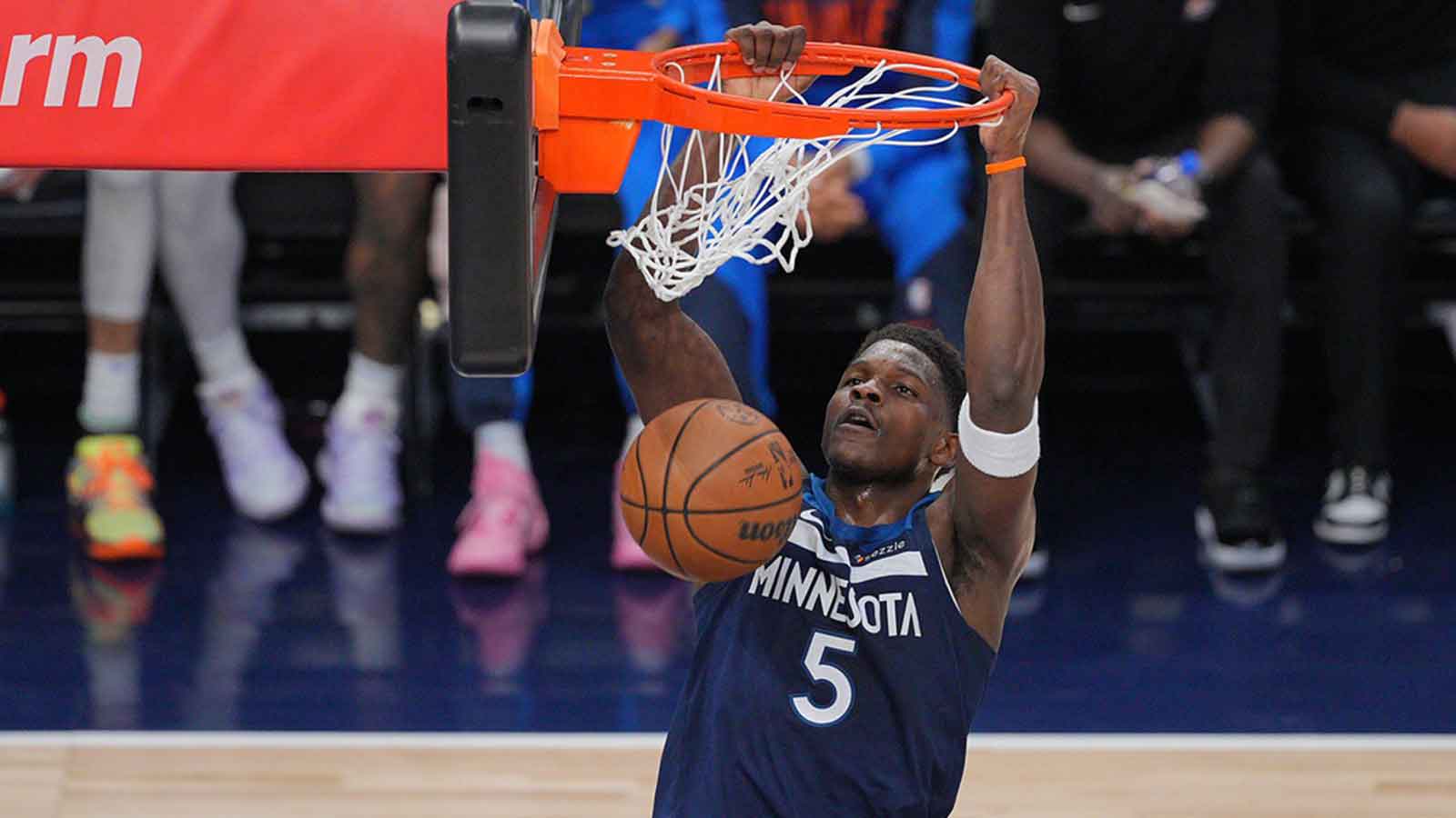 Minnesota Timberwolves guard Anthony Edwards (5) dunks the ball against the Oklahoma City Thunder during the first half in game three of the western conference finals for the 2025 NBA Playoffs at Target Center. 