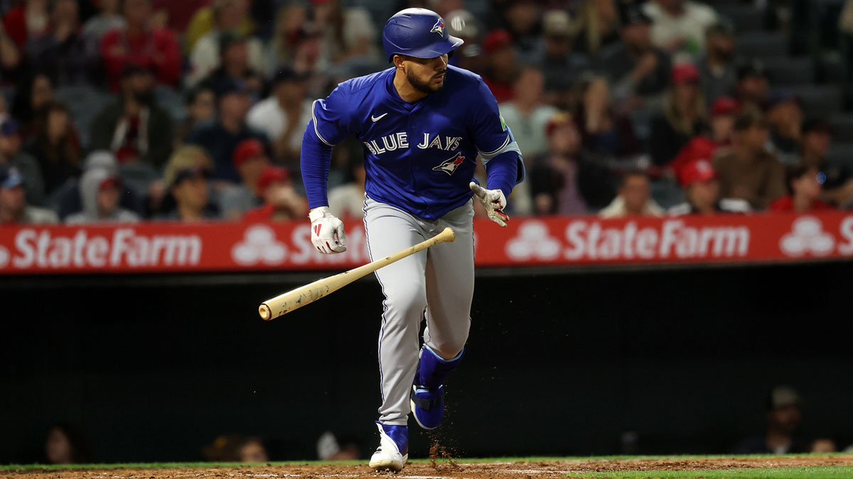 Toronto Blue Jays designated hitter Anthony Santander (25) hits an RBI single during the sixth inning against the Los Angeles Angels at Angel Stadium.