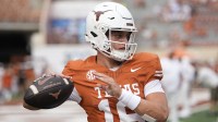 Texas Longhorns quarterback Arch Manning (16) warms up before the game against San Jose State Spartans at Darrell K Royal-Texas Memorial Stadium.