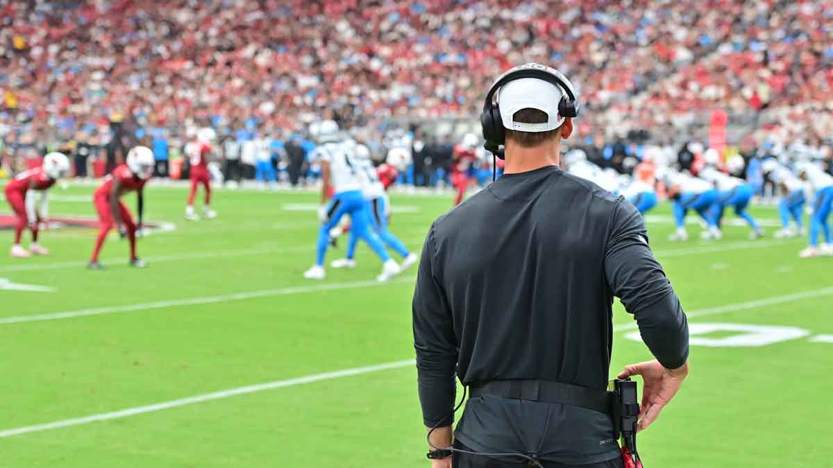 Arizona Cardinals head coach Jonathan Gannon watches play during the second quarter against the Carolina Panthers at State Farm Stadium.