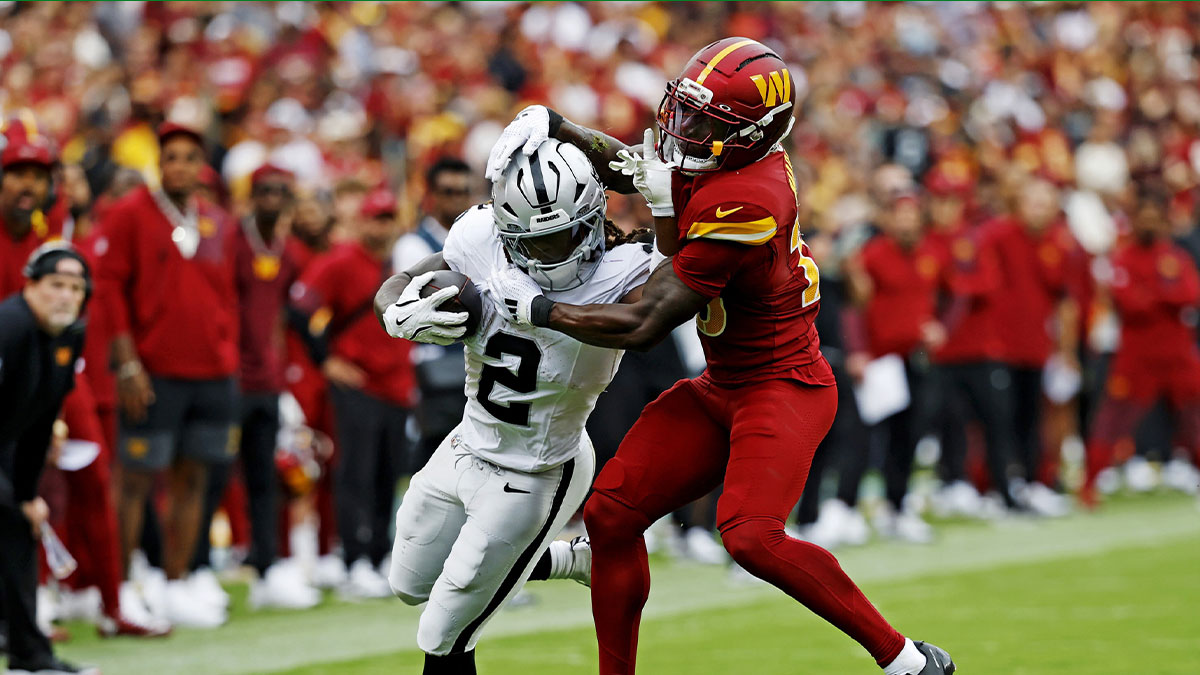 Las Vegas Raiders running back Ashton Jeanty (2) runs the ball during the second half against the Washington Commanders at Northwest Stadium.