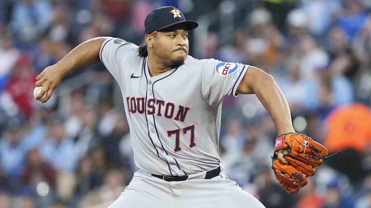 Houston Astros starting pitcher Luis Garcia (77) throws a pitch against the Toronto Blue Jays during the first inning at Rogers Centre.