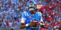 Mississippi Rebels quarterback Austin Simmons (13) warm ups between the first and second quarters against the Arkansas Razorback at Vaught-Hemingway Stadium.
