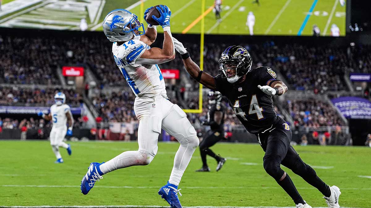 Detroit Lions wide receiver Amon-Ra St. Brown (14) makes a catch for a touchdown against Baltimore Ravens cornerback Marlon Humphrey (44) during the second half at M&T Bank Stadium in Baltimore, Md. on Monday, Sept. 22, 2025.
