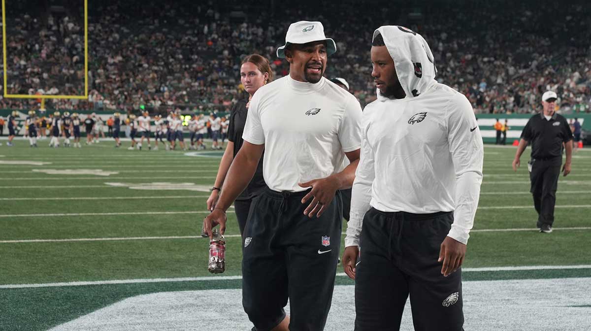 Jalen Hurts and Saquon Barkley of the Eagles walk off of the field at the end of the first half. The Philadelphia Eagles came to MetLife Stadium to play the NY Jets in the final preseason season game.
