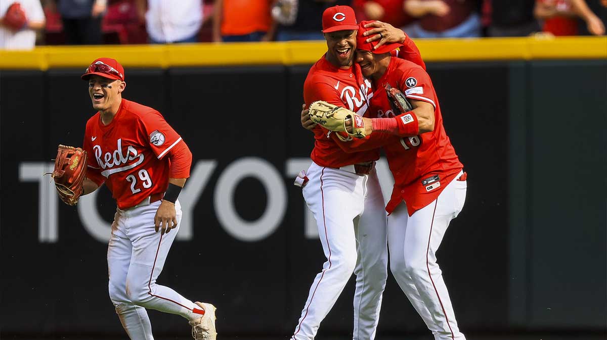 Cincinnati Reds outfielder Will Benson (30) hugs outfielder Noelvi Marte (16) after the victory over the Pittsburgh Pirates at Great American Ball Park.