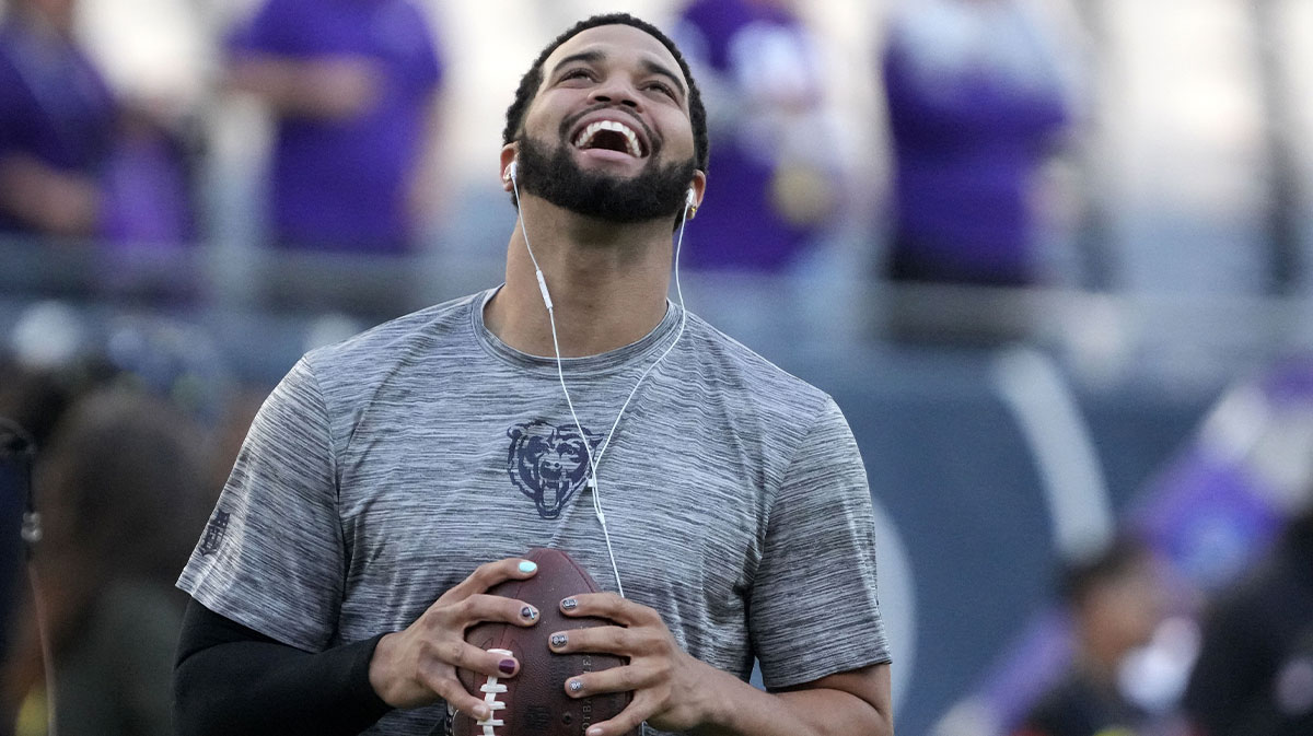 Chicago Bears quarterback Caleb Williams (18) practices before the game at Soldier Field.