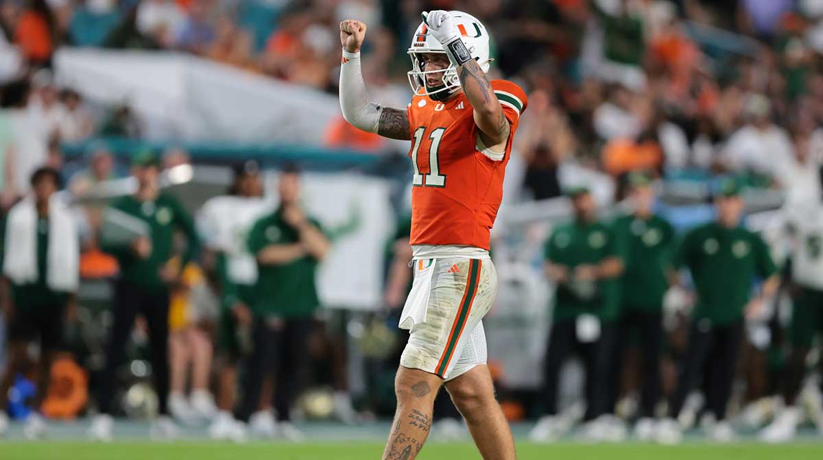 Miami Hurricanes quarterback Carson Beck (11) reacts against the South Florida Bulls during the third quarter at Hard Rock Stadium