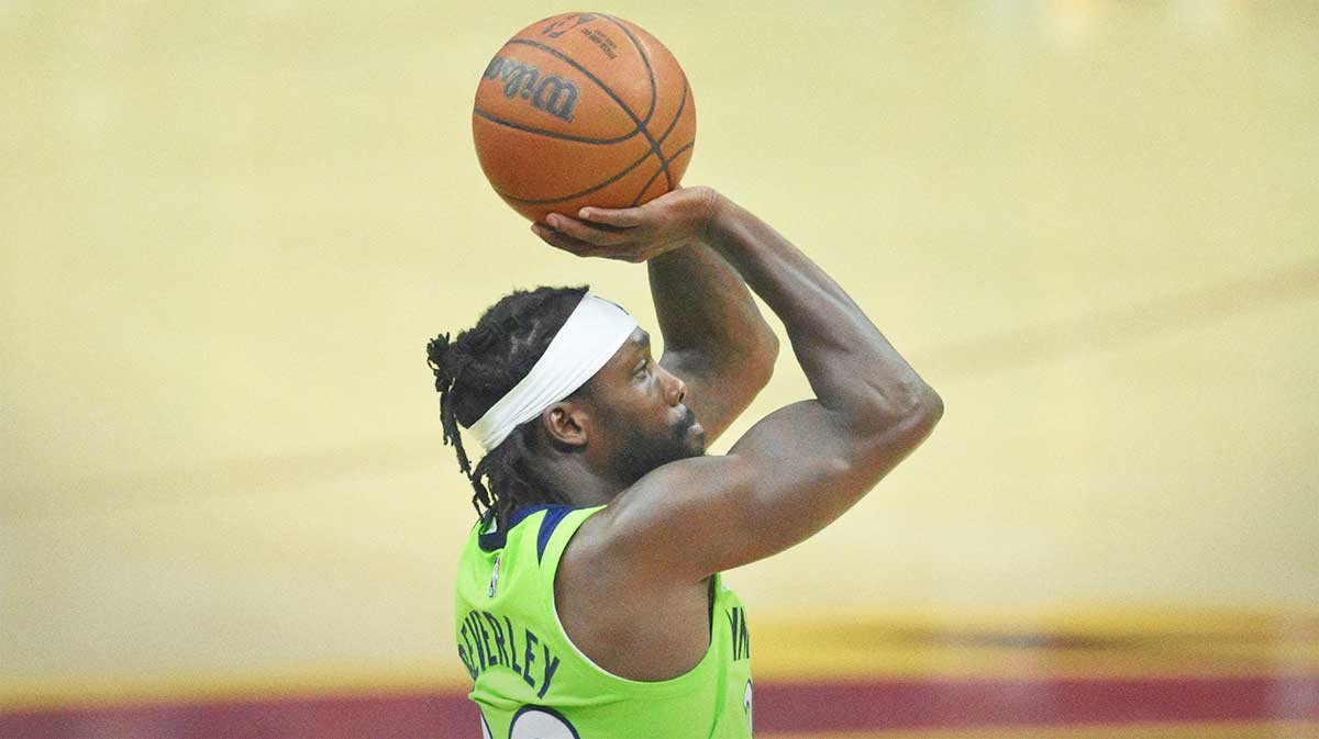 Minnesota Timberwolves guard Patrick Beverley (22) shoots in the first quarter against the Cleveland Cavaliers at Rocket Mortgage FieldHouse.