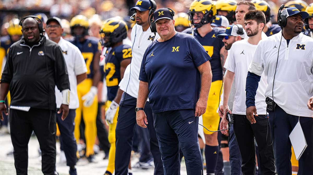 Michigan acting head coach Biff Poggi watches a play again