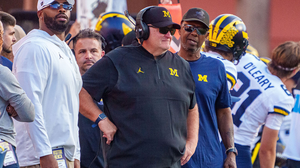 Michigan Wolverines acting head coach Biff Poggi watches during the fourth quarter against the Nebraska Cornhuskers at Memorial Stadium.