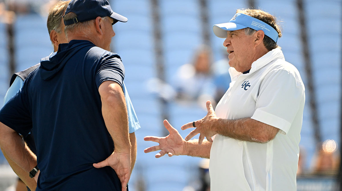North Carolina Tar Heels head coach Bill Belichick with Richmond Spiders head coach Russ Huesman before the game at Kenan Stadium.