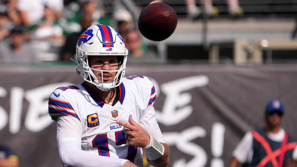 Buffalo Bills quarterback Josh Allen (17) drops back to pass against the New York Jets during the second half at MetLife Stadium.
