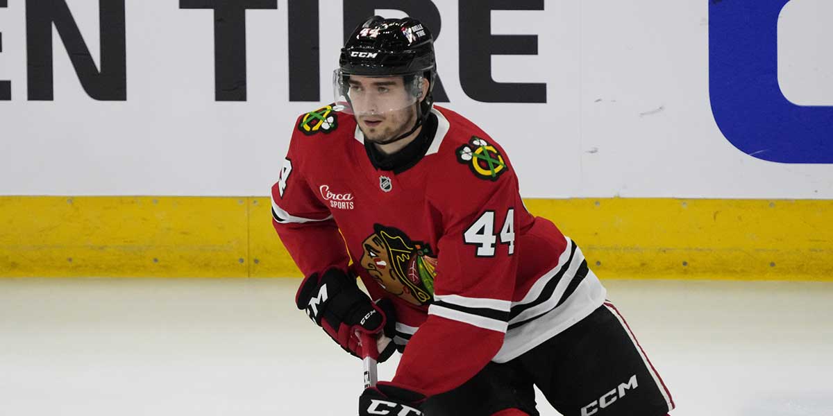 Chicago Blackhawks defenseman Wyatt Kaiser (44) warms up before a game against the New Jersey Devils at United Center.