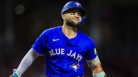Toronto Blue Jays shortstop Bo Bichette (11) reacts after a play in the seventh inning against the Cincinnati Reds at Great American Ball Park.