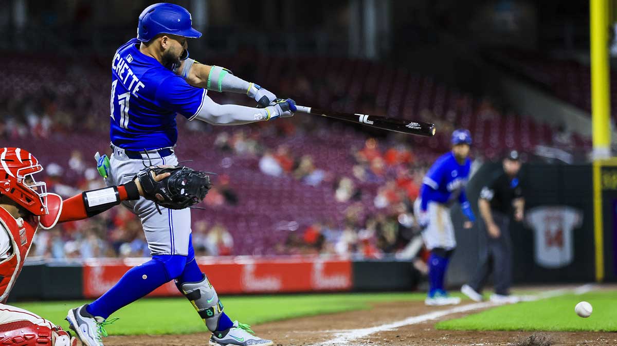 Toronto Blue Jays shortstop Bo Bichette (11) hits a fielder’s choice RBI in the eighth inning against the Cincinnati Reds at Great American Ball Park.