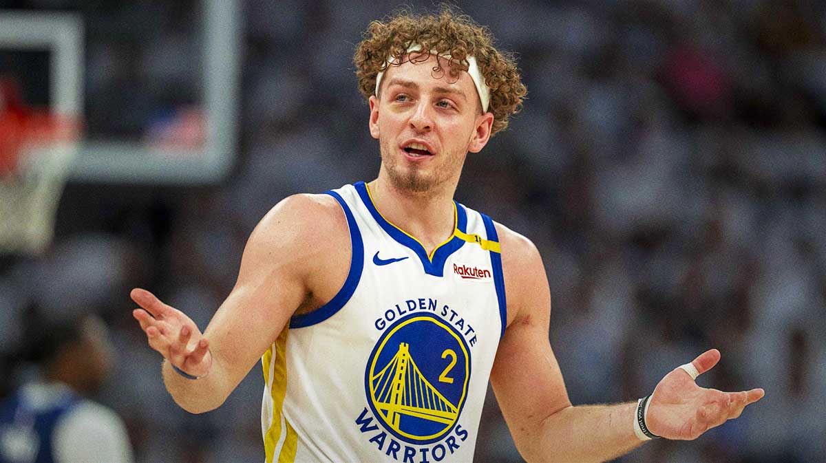 Golden State Warriors guard Brandin Podziemski (2) reacts to a foul called against the Minnesota Timberwolves in the second half during game five of the second round for the 2025 NBA Playoffs at Target Center.