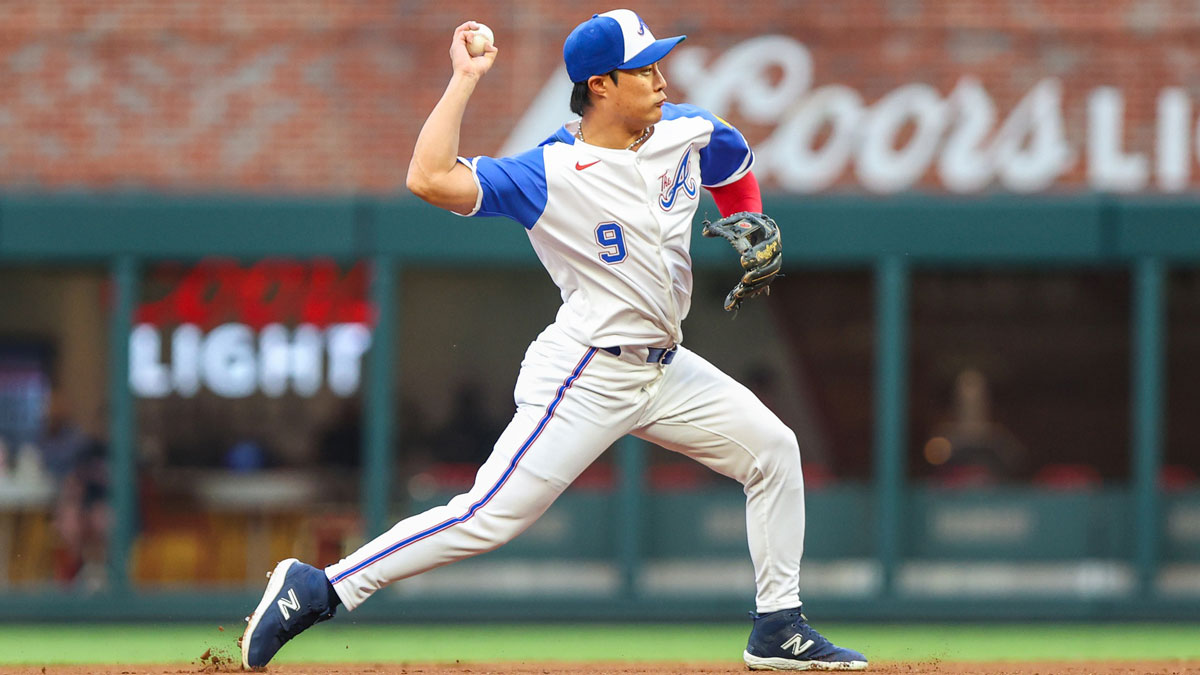 Atlanta Braves shortstop Ha-Seong Kim (9) throws the ball to first base for an out against the Seattle Mariners during the first inning at Truist Park.