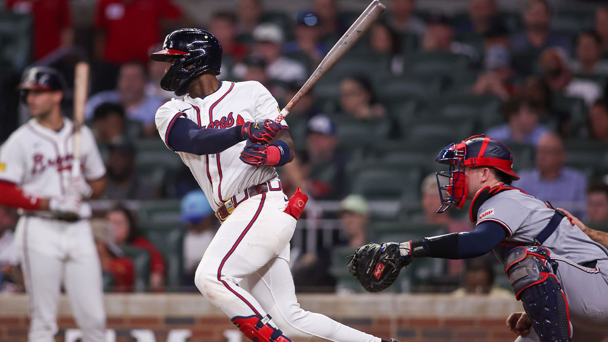 Atlanta Braves left fielder Jurickson Profar (7) hits an RBI single against the Washington Nationals in the sixth inning at Truist Park.